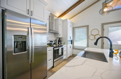 Broken Bow Cabin | Treetop Twosome · Cozy Forest Retreat: Sauna, Firepit & EV Charger