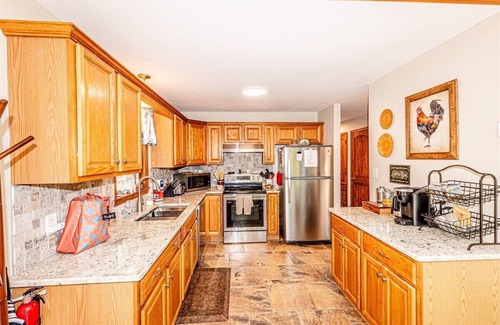 Bryson City Cabin | Treetops Retreat: A Cozy 3-Bedroom Cabin in Beautiful Bryson City, NC with Forest Views.