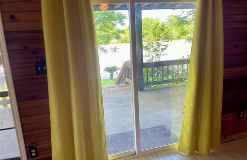 Trinity House | Trinity Chalet, Lakefront Downstairs Home w/, Covered Patio! Sleeps 3