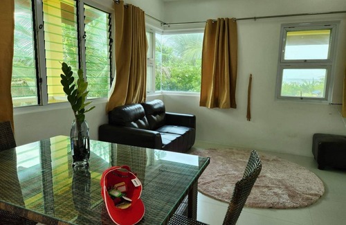 Morong Villa | Triple M Vacation Villas - Yellow house