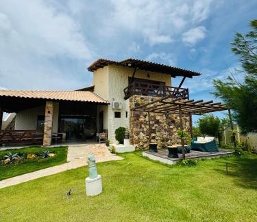 Coqueiro House | Triplex frente mar, com rooftop, piscina e jacuzzi!