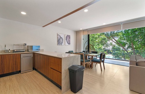 Playa Paraiso Apartment | Tropical 2 Bedroom | Private Balcony & Rooftop | Casago