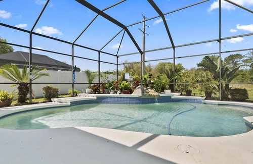 Palm Harbor House | Tropical Azalea Oasis | Palm Coast 2BR Guest Wing w/Pool | Partial Home Rental