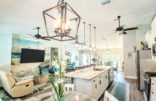 Vero Beach House | Tropical escape! Heated pool with hot tub ,Tiki Bar. Close Beaches, live music !