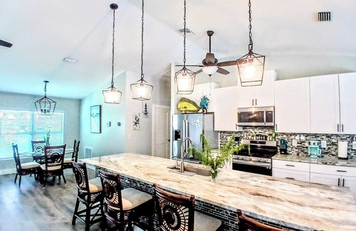 Vero Beach House | Tropical escape! Heated pool with hot tub ,Tiki Bar. Close Beaches, live music !