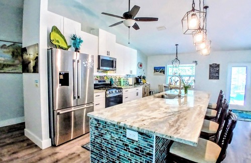 Vero Beach House | Tropical escape! Heated pool with hot tub ,Tiki Bar. Close Beaches, live music !