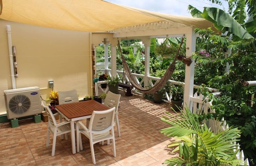 All Saints Apartment | Tropical garden cottage -private with patio & courtyard. Plus vehicle for rent