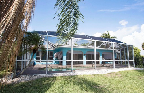 Punta Gorda House | Tropical island style pool home