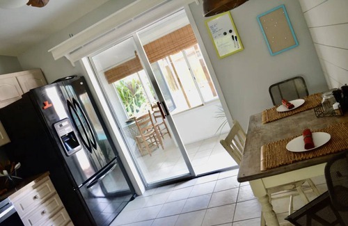 Fowlers House | Tropical Island House, Heated Pool, Near Beach, Disney, Kennedy Space Center