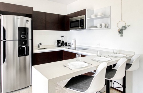 Tulum City Center Apartment | Tropical luxurious apartment with pools, rooftop views, & balcony - dog-friendly