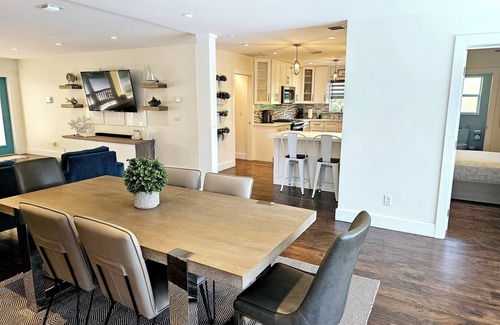Garden Isles House | Tropical Luxury Living, waterfront, pool heated, close to the beach