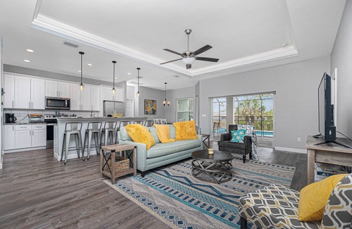 Englewood East House | Tropical Oasis with saltwater pool & hot tub on a canal 8 miles from beaches