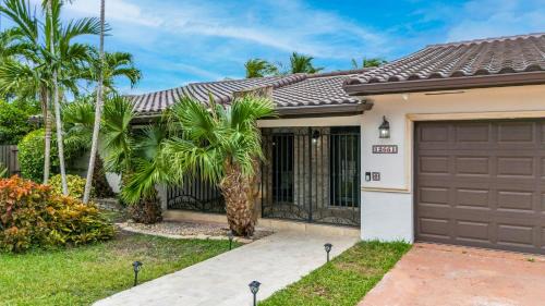Tamiami House | Tropical Oasis with Heated Pool and BBQ