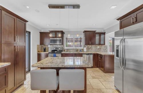 Tamiami House | Tropical Oasis with Heated Pool and BBQ