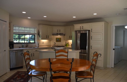 Palm City House | Tropical Paradise! Heated Pool & Sauna. Large very private yard. Near Everything