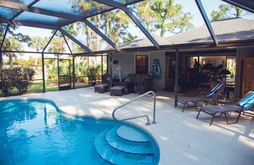 Palm City House | Tropical Paradise! Heated Pool & Sauna. Large very private yard. Near Everything