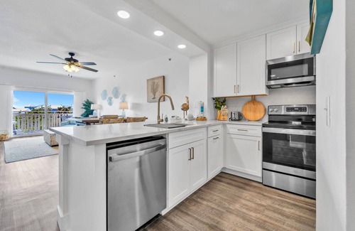 Waterside Village Condo | Tropical Retreat with Canal Views, Beach Service, Pool, Hot Tub