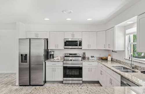Golden Beach Estates House | Tropical-Inspired Beachside Home w/BBQ Grill & Heated Pool