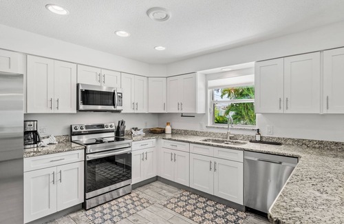 Golden Beach Estates House | Tropical-Inspired Beachside Home w/BBQ Grill & Heated Pool