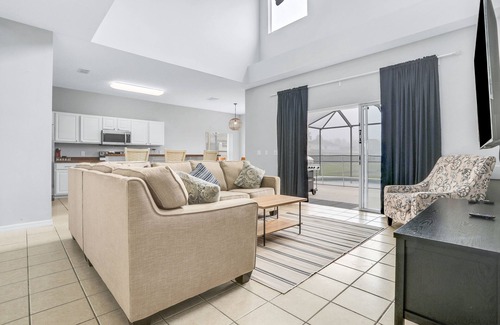Cumbrian Lakes House | Tropical villa overlooking the lake with a private pool, spa, grill, & AC