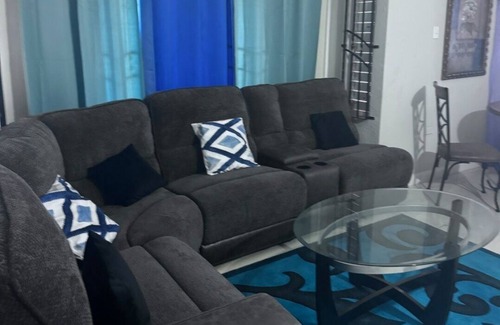 Spring Village House | Ts Staycation - a charming 2-bedroom house with WiFi, AC in Spanish Town