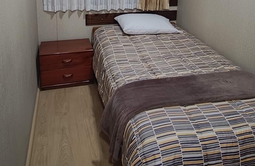 Cerro Colorado District Apartment | Tu Hogar Acogedor en la Ciudad con Estacionamiento Gratuito