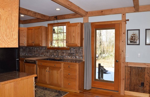 East Falmouth House | Tucked away in a private wooded setting