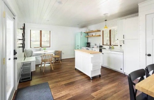 Traverse City House | Tucked down a long dirt drive, this property is private, serene & has an awesome beach front!