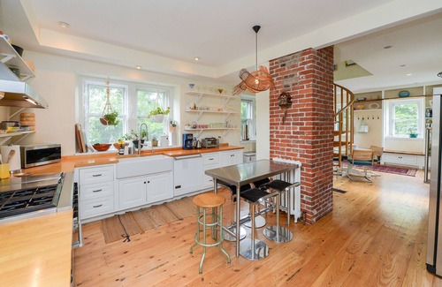 West Mount Airy Villa | Tudor Mansion With Outdoor Oasis and Swimming Pool