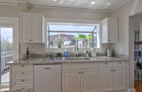 Southeast Magnolia House | Tudor Style Home in Relaxed Magnolia Neighborhood