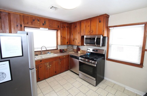 Tulsa House | Tulsa home conveniently by Brookside and Riverside with large fenced backyard