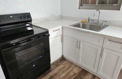 Tamuning Bed & Breakfast | Tulu Famaguon Newly Renovated 2 BR 1BA Entire Apartment Free Wifi, Continental Breakfast, Parking