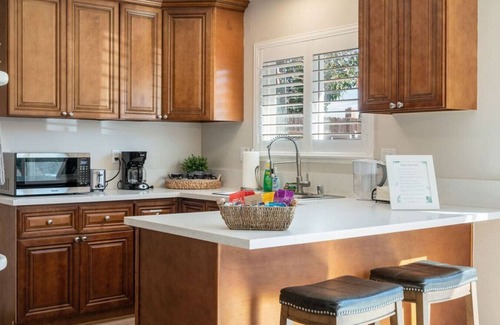 Rowland Heights House | Twilight Paradise: 4 Bedrooms, 2 Bathrooms, Private Pool, Patio Dining for 8, BBQ, and a One-of-a-Kind Indoor Fireplace.