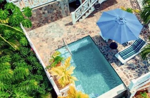 Princess Margaret Bay House | Two Apartment Beachview Home w/Pool