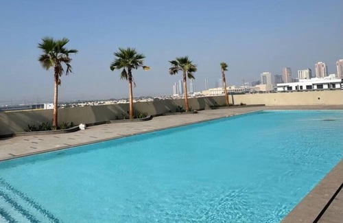 Jumeirah Village Triangle Apartment | Two Bedroom: Modern and Chic with Balcony