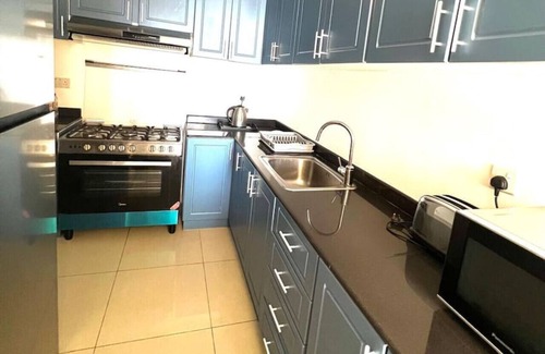 Al Hamra Village Apartment | Two Bed Room Apartment with Balcony and sea view