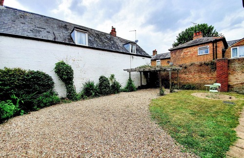 Chatteris Cottage | Two bed townhouse with private off-road parking.