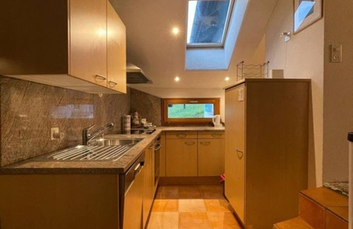 Anzonico Apartment | Two-bedroom apartment with mountain view and garden (SANTORINI)