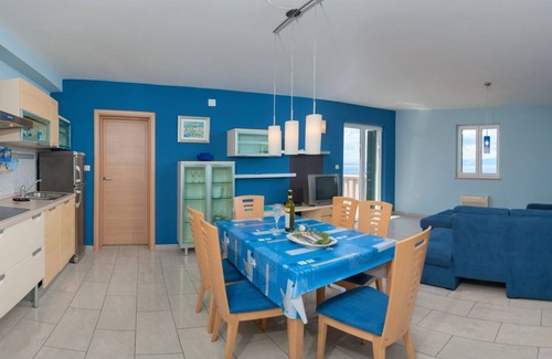 Postira Apartment | Two bedroom apartment with balcony and sea view Postira, Brač (A-15242-d)