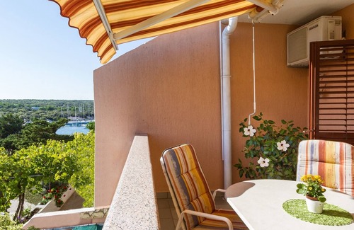 Simuni Apartment | Two bedroom apartment with terrace and sea view Šimuni, Pag (A-4083-a)