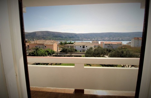 Pag Apartment | Two bedroom apartment with balcony and sea view Pag (A-13060-c)