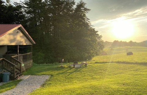 Logan Cottage | Two bedroom cabin with hot tub and sunset views
