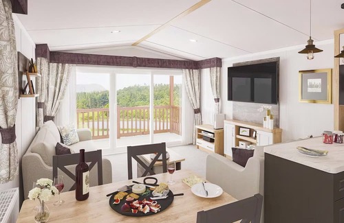 Aberystwyth House | Two bedroom caravan, sleeping four people, perfect for relaxing by the coast.