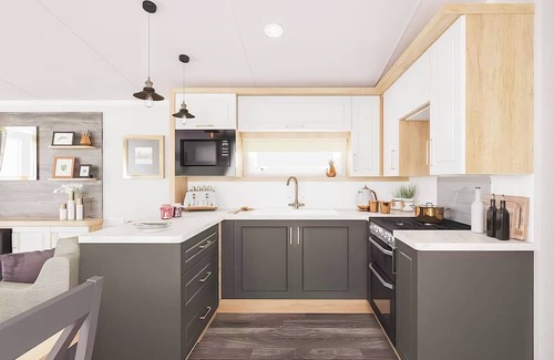Aberystwyth House | Two bedroom caravan, sleeping four people, perfect for relaxing by the coast.