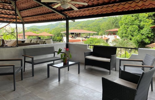 Coco Apartment | Two Bedroom condo with Great Roof Terrace and walking distance to the beach