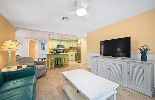 Holmes Beach Cottage | Two Bedroom Cottage with Tropical Landscaping Surrounding Private Heated Pool!