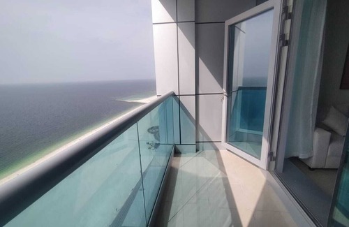 Rumailah Apartment | Two-bedroom hotel apartment with a living room and a sea view, VIP