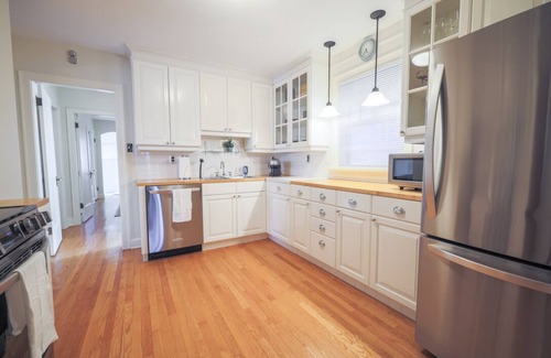 Mount Royal Condo | Two-Bedroom Inner-City Heritage Home With Contemporary Furnishings and Parking
