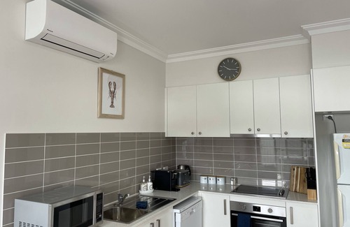 Manyana Villa | Two bedroom villa with private courtyard, a short walk to Manyana Beach.
