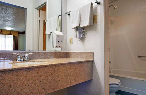Decatur Hotel | Two Convenient Room Located at I-28 | Outdoor Pool & Free Parking